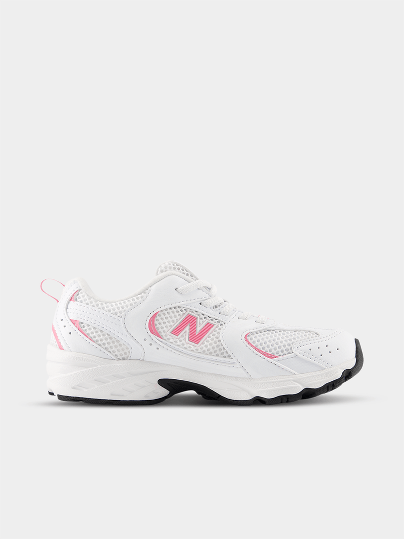 New Balance 530 white with pink “N” accent
